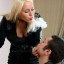 Mistress blowing smoke in slave's face Mistress blowing smoke in slave's face