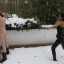 Mistress Nina throwing a snowball