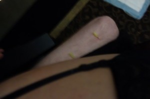 Pierced leg besides Mistress Stone's leg Pierced leg besides Mistress Stone's leg